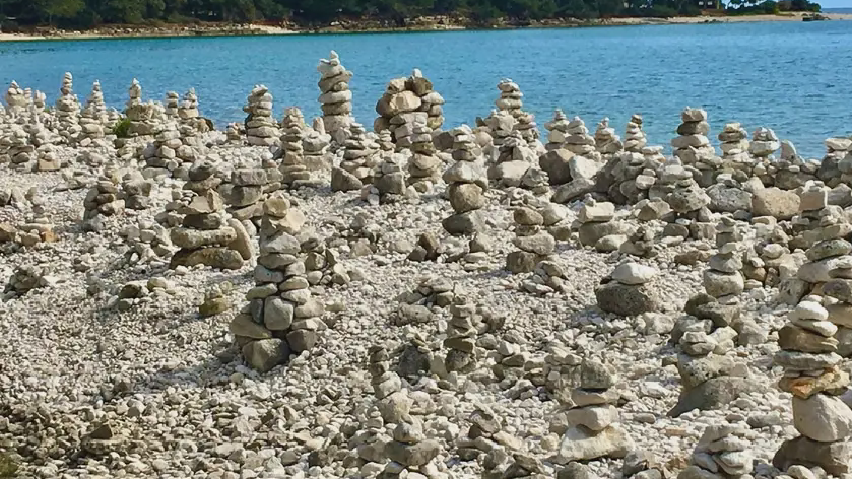 Smooth stone beach in Zlatni Rt park