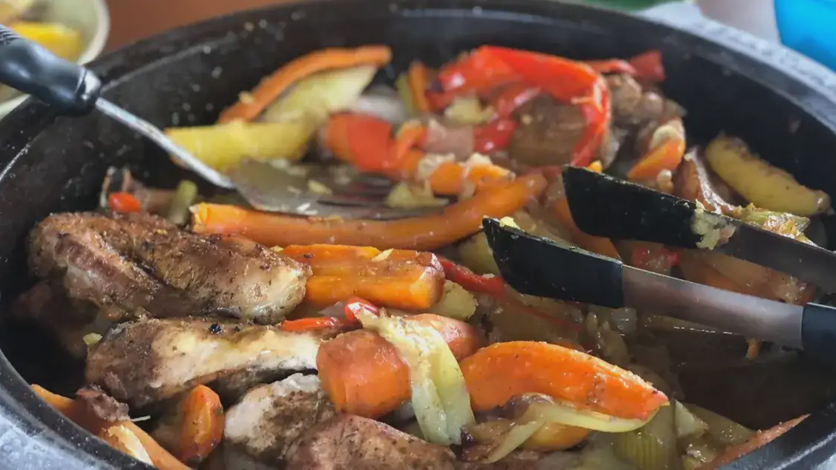 Traditional peka cooking under bell lid